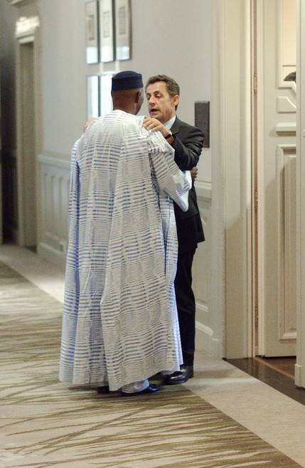 France's President Nicolas Sarkozy (R) g