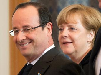 Le président français François Hollande et la chancelière allemande Angela Merkel au sommet de Varsovie, le 6 mars 2013. AFP 
