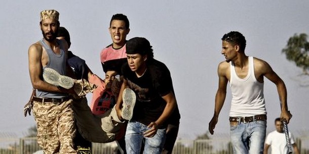 L'attaque d'un QG d'une milice soutenue par l'armée libyenne a fait 28 morts et 60 blessés, samedi 8 juin à Benghazi. | AP/Uncredited