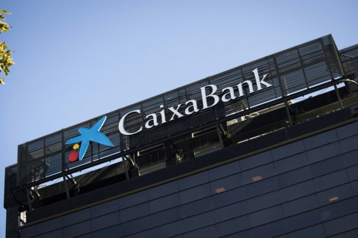 CaixaBank La troisième banque espagnole CaixaBank transfère , CaixaBank, a décidé de transférer son siège social hors de Catalogne