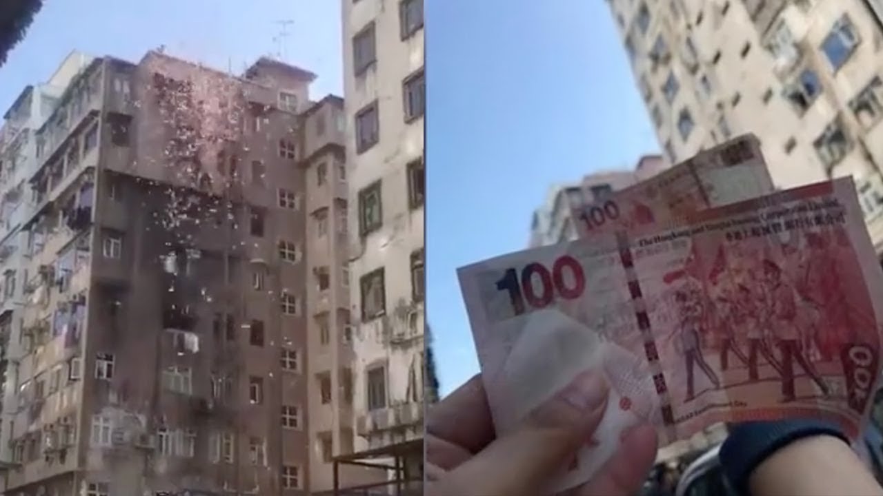 [ Vidéo] Il jette 20.000 euros du haut d'un immeuble: "L'argent peut tomber du ciel"